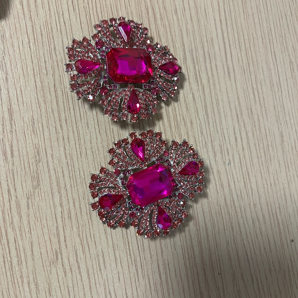 Beautiful fuschia brooches camera does no justice